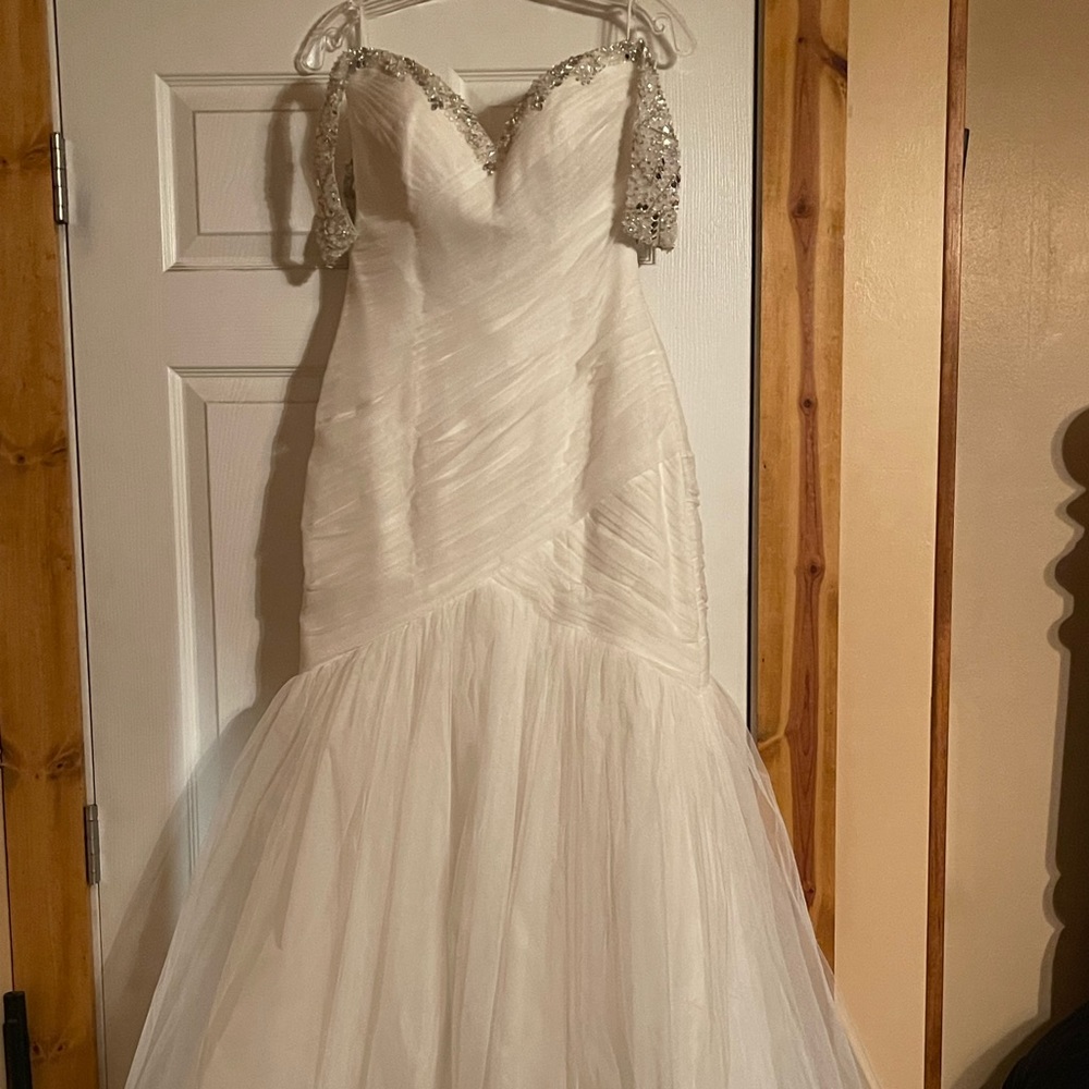 Wedding dress. Never worn other than to try on three times.